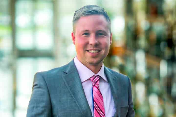 Professional headshot of Chris Jagalski in business attire indoors