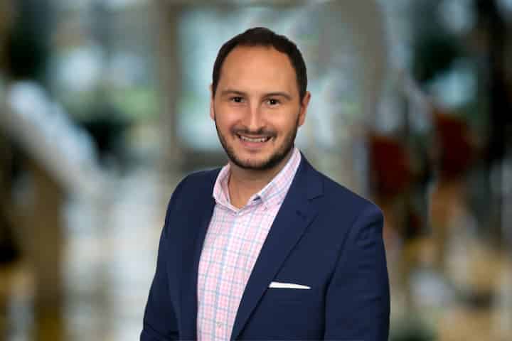 Professional headshot of Jeff Giammanco in business attire indoors