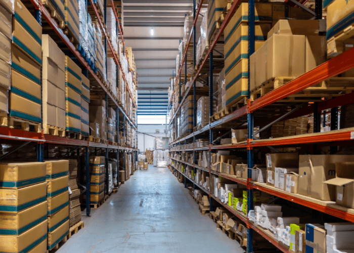 Warehouse aisle with tall storage racks