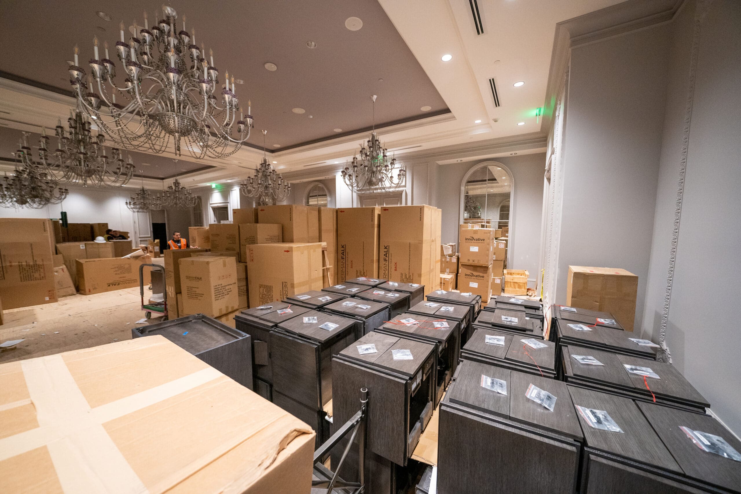 Furniture showroom or staged interior with wrapped items