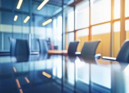 Conference room with glass walls and chairs