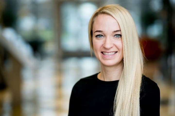 Professional headshot of Jillian Chrischilles in business attire indoors